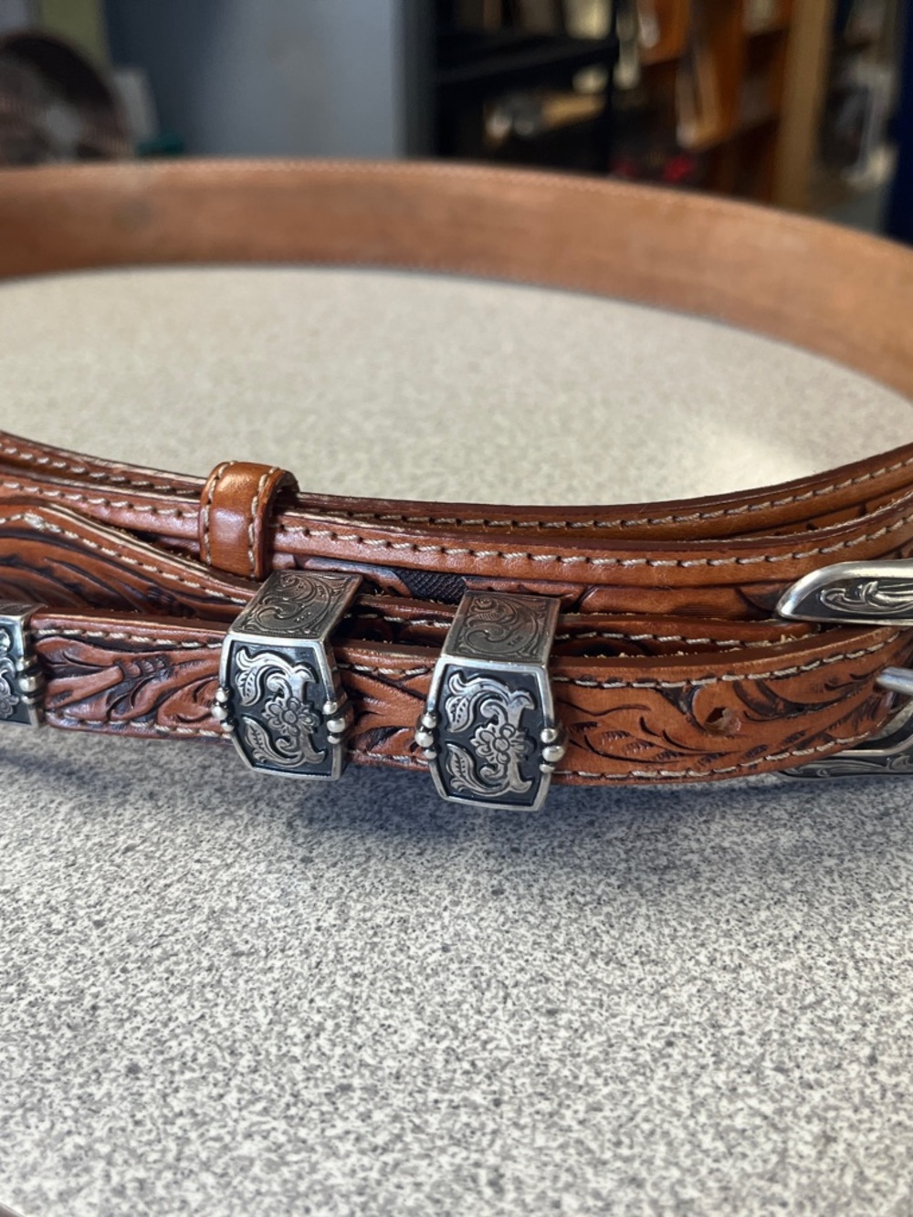 Tony Lama Hand‑Tooled Brown Leather Belt with Ornate Sterling Silver Accents